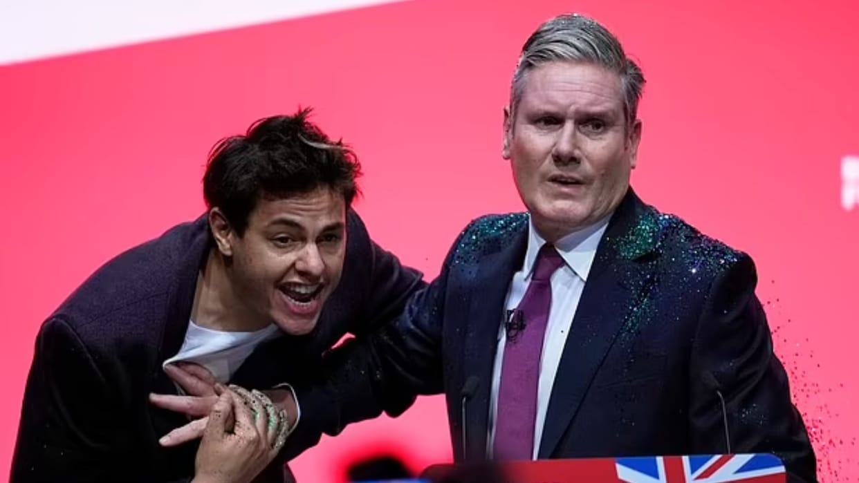 UK: Opposition leader Keir Starmer was going to give a speech, protestor threw glitter powder; watch video