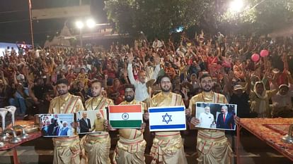 Praying for salvation from Mother Ganga for those who died in Israel special aarti at Assi Ghat