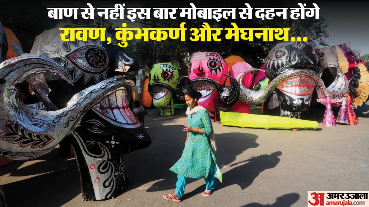 Effigies of Ravana Kumbhakarna and Meghnath burn through touch the mobile screen in delhi