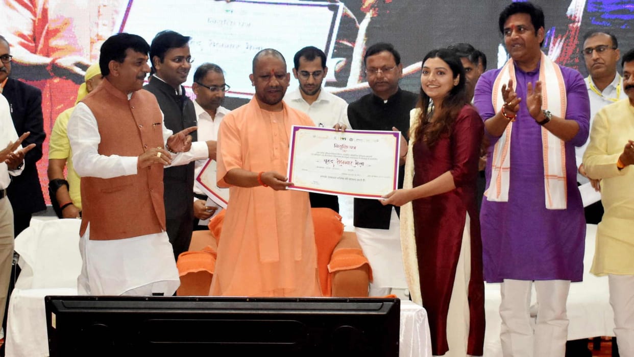 When received check from CM yogi felt doubly happy