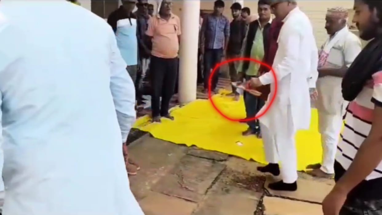 MP Election 2023: BJP MP Janardan Mishra lifted shoes and slippers of workers video goes viral on social media