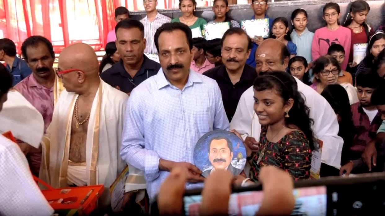 ISRO chief s somanath performs Vidyarambham ritual with children on the occasion of Vijayadashmi