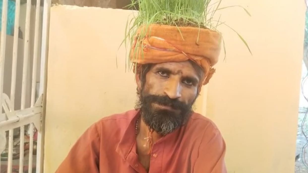 A person started a strange practice by giving up food and growing grains on his head in Rajgarh