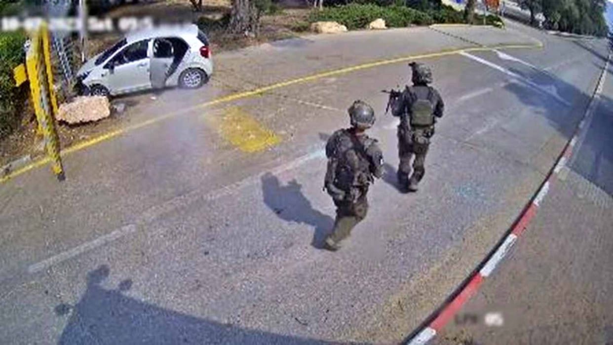 Israel Hamas War IDF video Kibbutz Beeri soldiers chasing Hamas terrorists