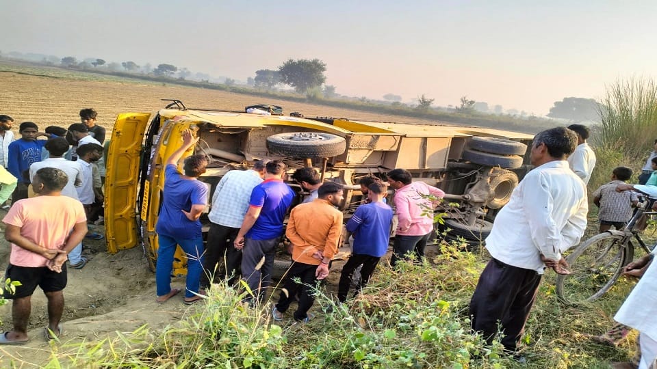 School bus overturned in potato field