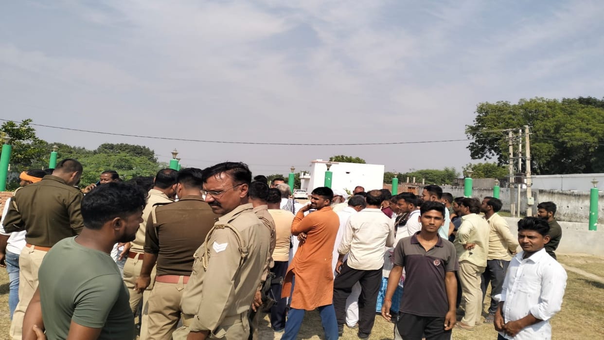 Dispute between two communities over burial of dead body, body buried at another place