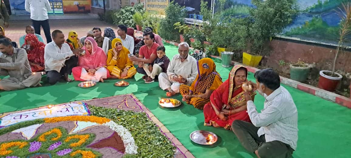 Praying for the long life of her husband from behind the bars, women prisoners broke their fast in Prison
