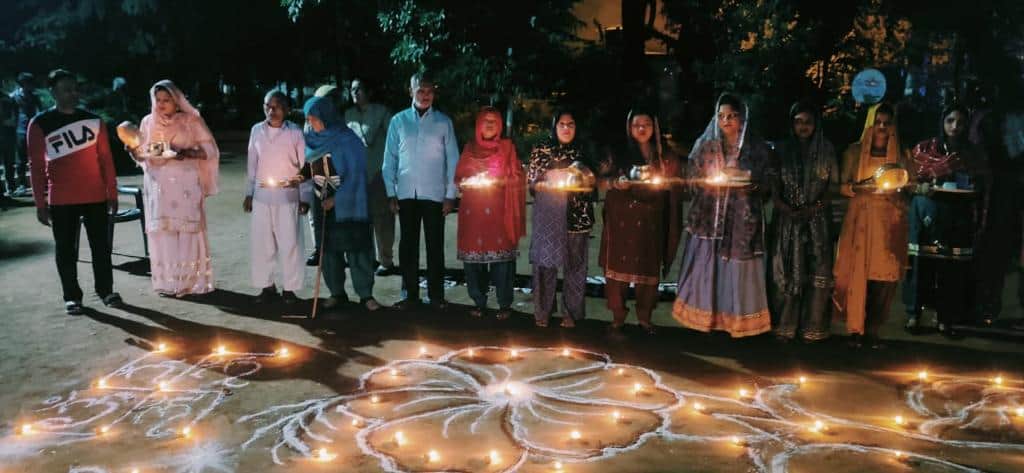 Praying for the long life of her husband from behind the bars, women prisoners broke their fast in Prison