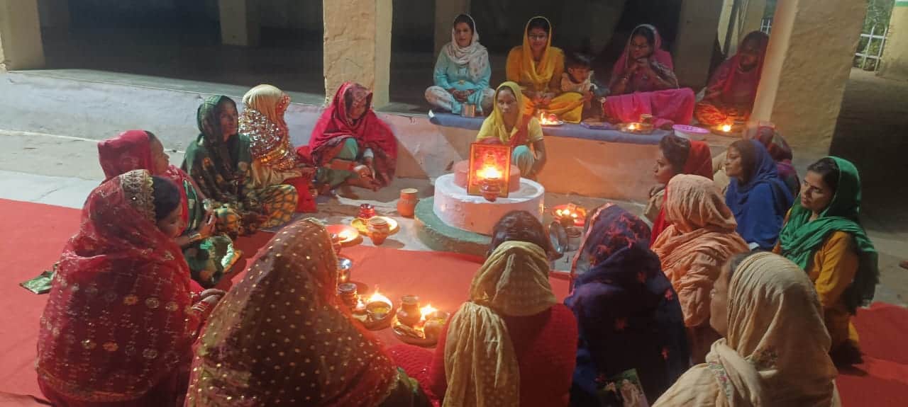 Praying for the long life of her husband from behind the bars, women prisoners broke their fast in Prison