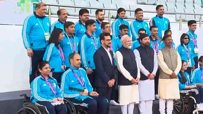 PM Narendra Modi interacts with Asian Para Games contingent at Major Dhyan Chand National Stadium