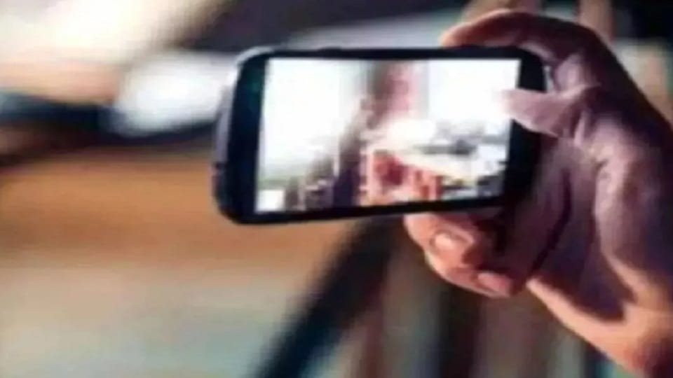 Woman accuses young man of making video while bathing