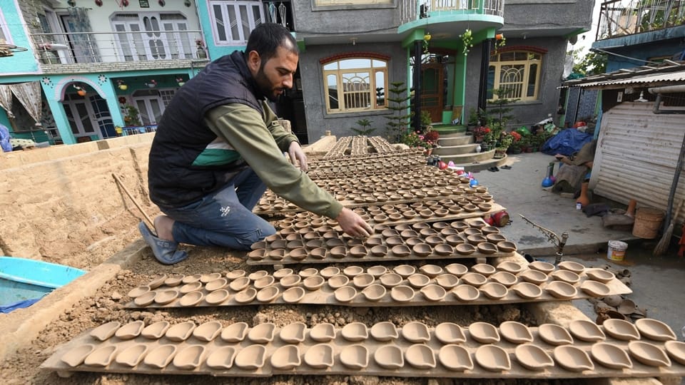 Jammu Kashmir: Preparations for Diwali Mohammad Umar of valley making mud lamps