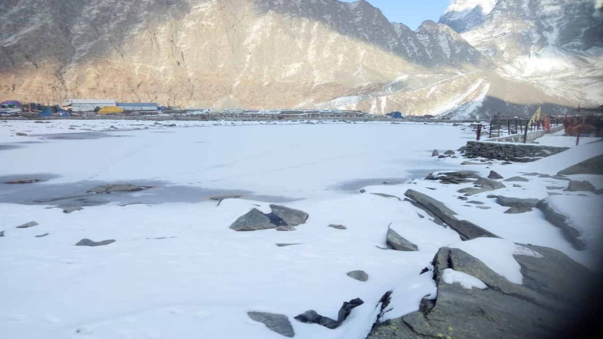 Trekkers reaching Manimahesh Lake to visit the holy Mount Kailash
