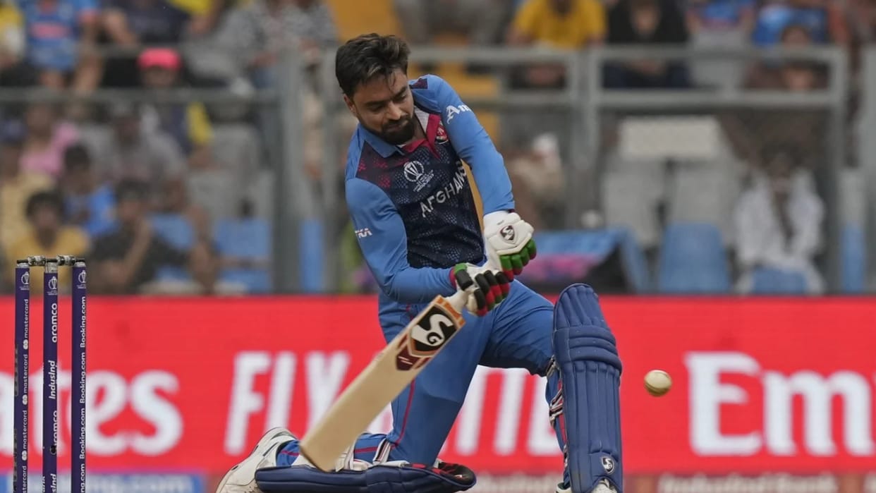 Rashid Khan Explosive Batting against Mitchell Starc in ODI WC 2023 AFG vs AUS Match Last Over Watch Video