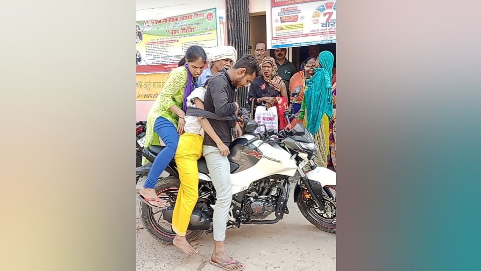 Young Man Tied sister body on his back and took it away on a bike In Auraiya