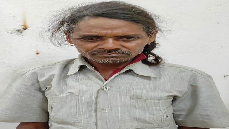person was killed by ax due to dispute in Kabirdham