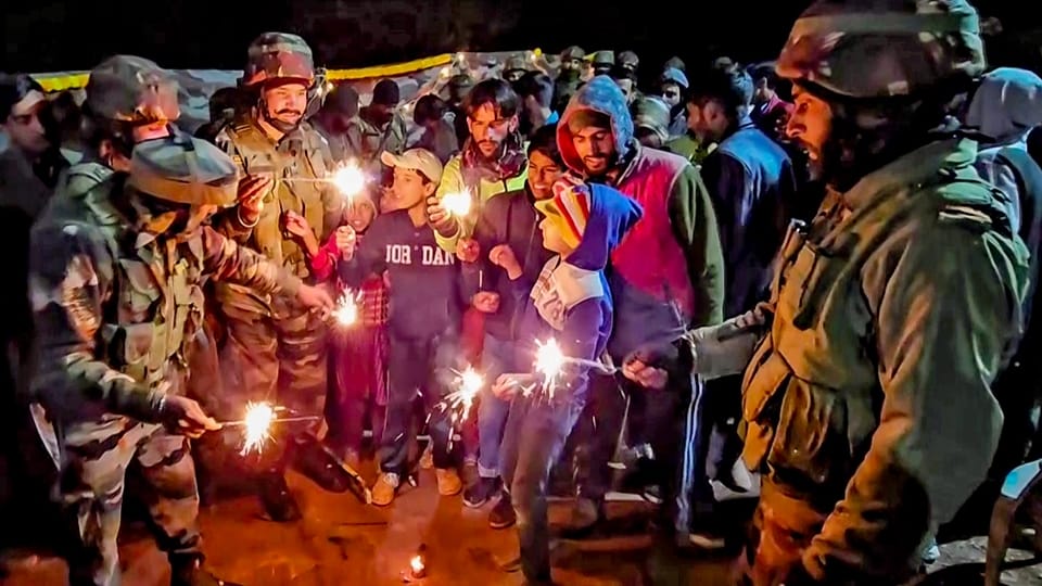 Indian and Pakistan soldiers exchange sweets on Diwali along LoC in Poonch