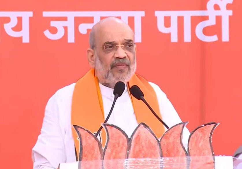 MP Election 2023 Amit Shah said- Press the lotus button so hard that electric shock hits Italy