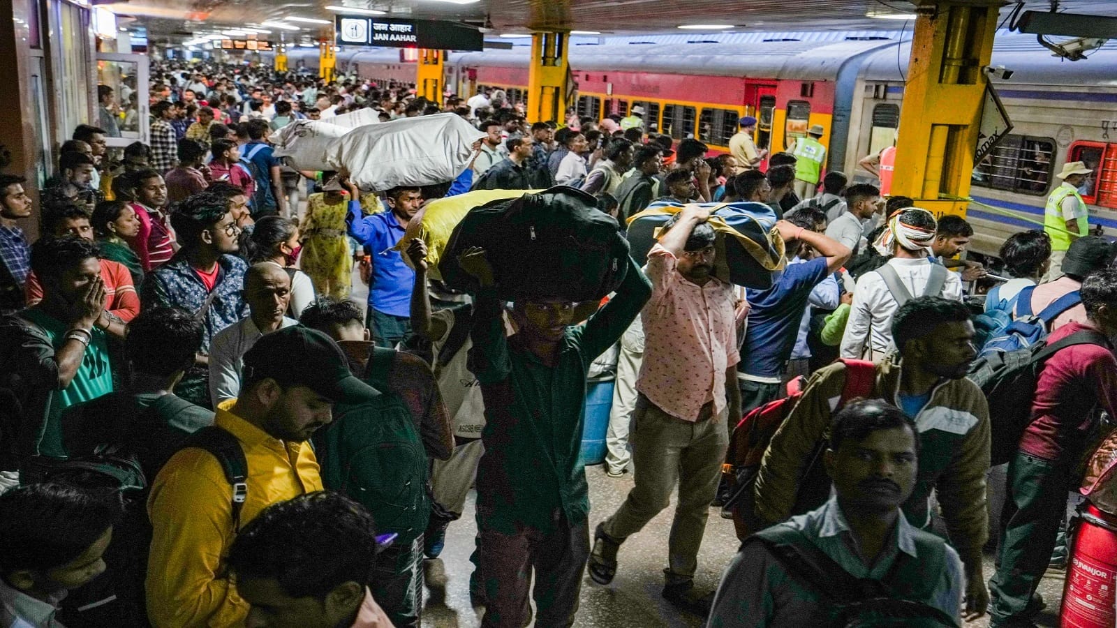 Crowd of passengers at railway stations in Delhi people are struggling for every seat