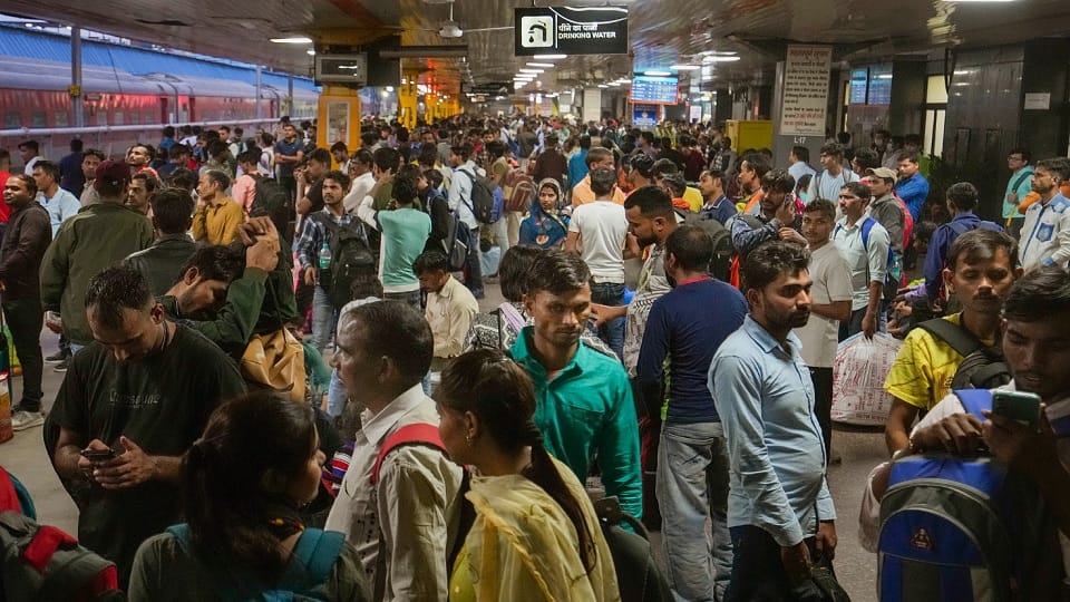 Crowd of passengers gathered at railway stations and bus stands during the festive season