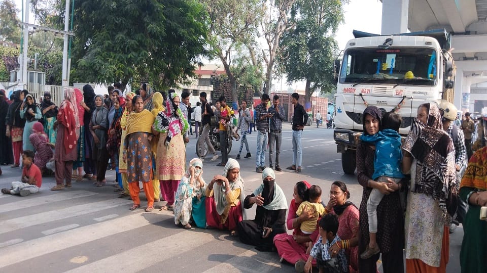 Water was not available in these areas around Taj Mahal for three days women sitting on road blocked way