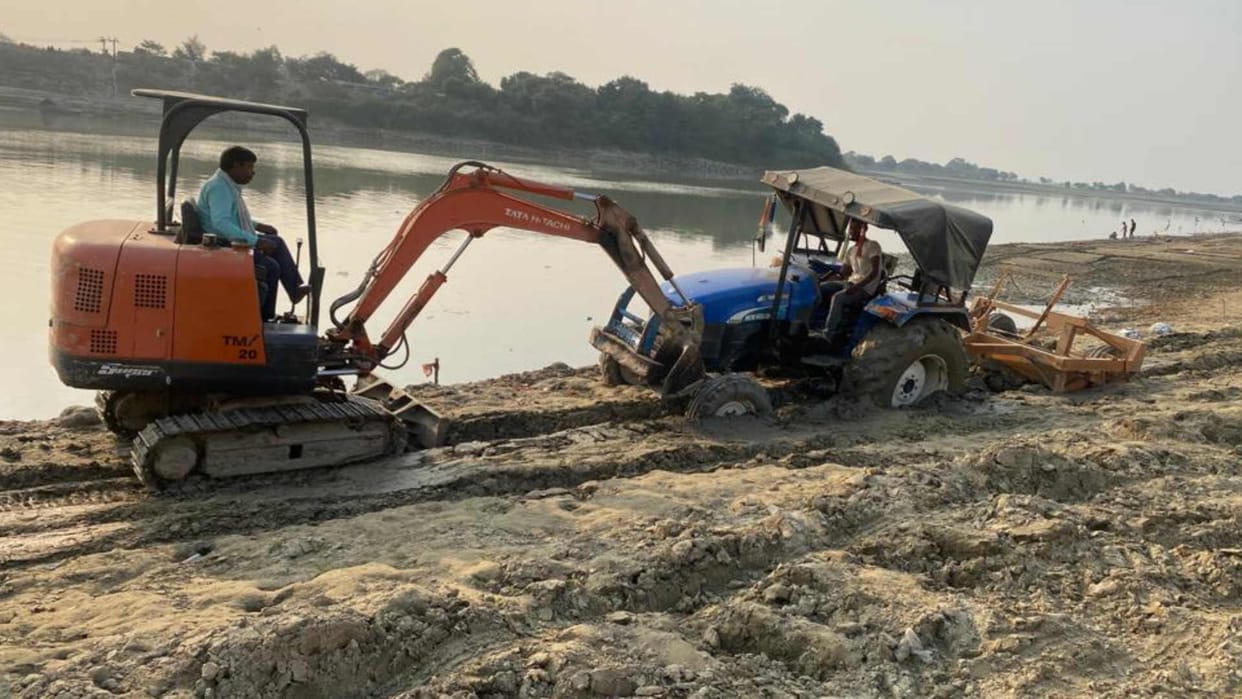 Goraksh Ghat covered with mud tractor sunk in swamp