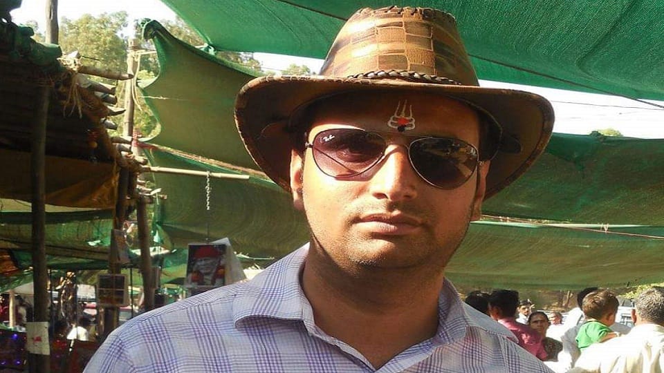 Dead body of Iglas youth found lying in the plot