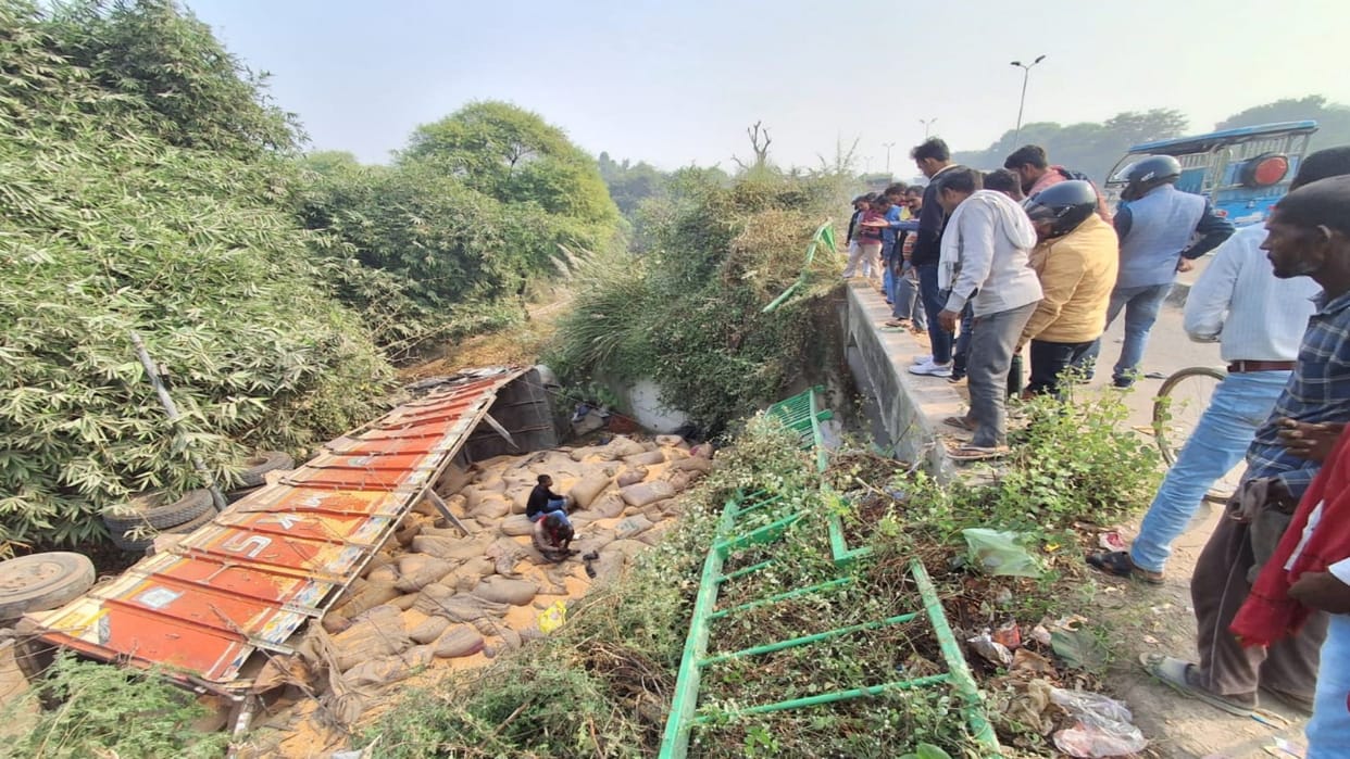 Uncontrolled truck broke the railing of Rewa Highway and fell 20 feet below in Shuats complex