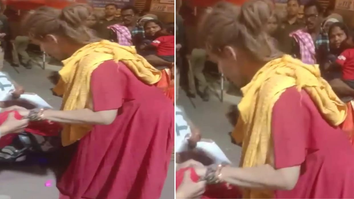 German woman created ruckus at Godaulia intersection, clashed with passers-by, snatched bags and luggage