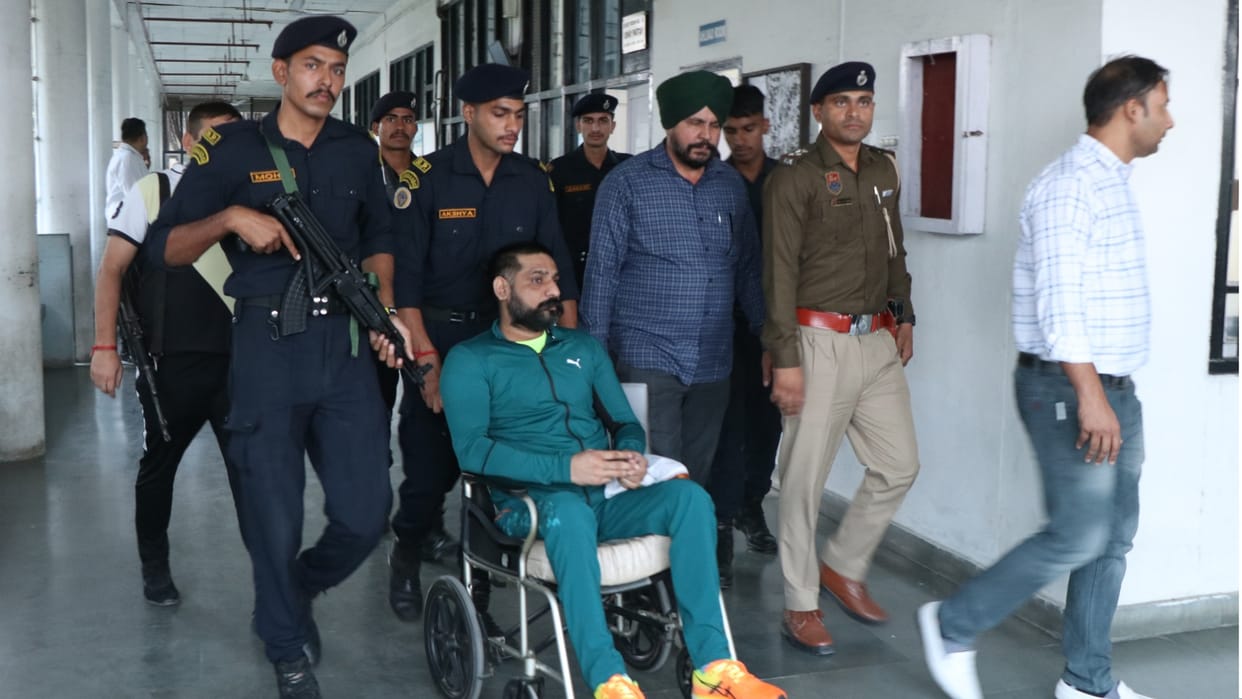 Poisonous liquor case: Gangster Monu Rana presented in court on wheel chair