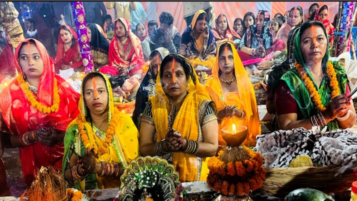 fast was broken by offering Arghya to the rising sun, fasting women stood in water for three hours and worship
