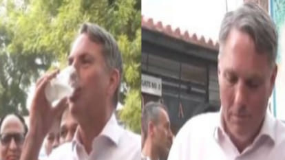 Australian Dy PM Marles drinks 'nimbu pani', eats 'Ram laddu' at street stall in Delhi, pays through UPI