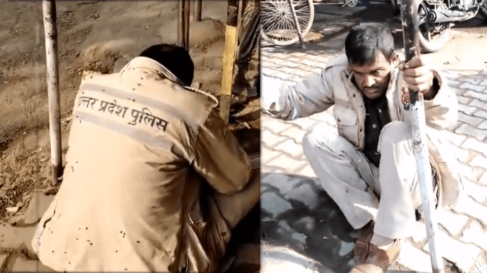 Inspector lying on road under influence of alcohol in Garh Muktesanar fair video