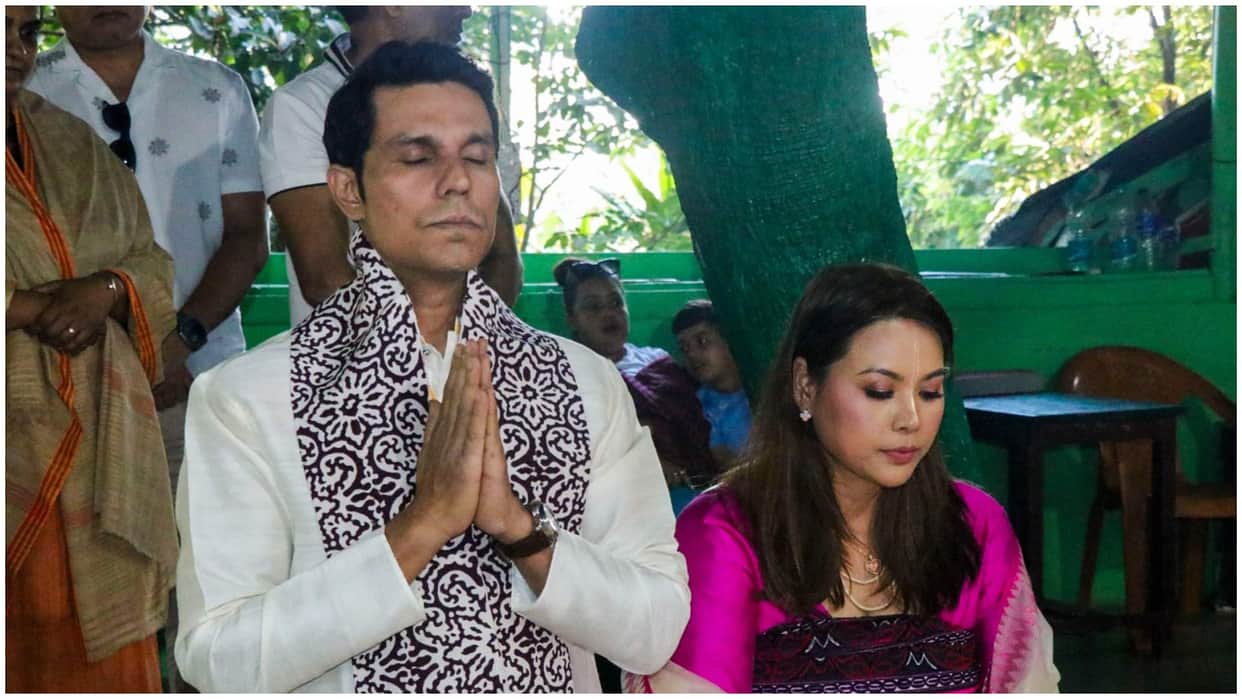 couple at a local deity Ipudhou Marjing shrine ahead of their wedding ceremony