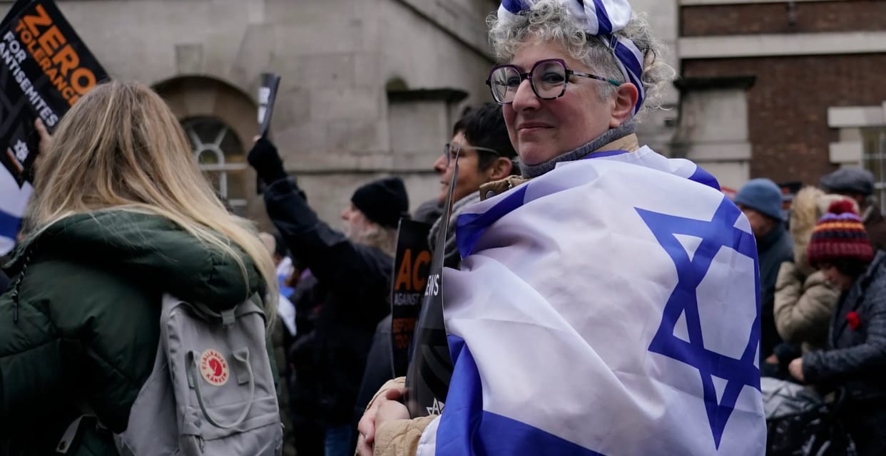 USA two women arrest for attacking jewish person after stoping ripping down israel hostage posters in new york