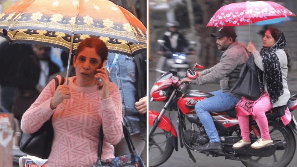 people took out umbrellas and warm clothes After rain in Delhi see pictures