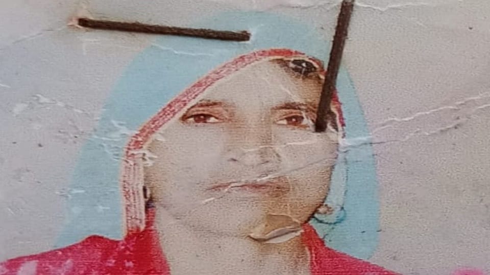 A woman going to the bank dies after falling from a loader