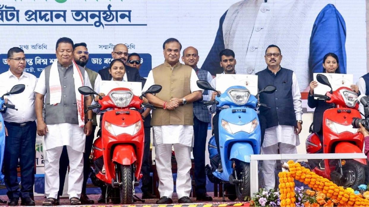 Assam Chief Minister Himanta Biswa Sarma distributes scooters under Pragyan Bharati scheme in Guwahati