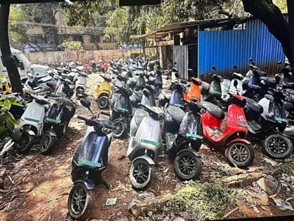 Dissatisfied Ola electric scooter customers protest in front of Ola showroom in Hubbali