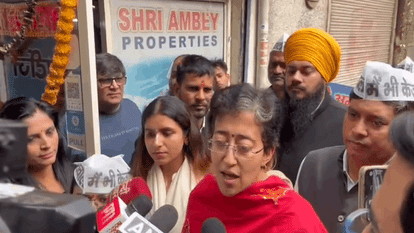 Delhi Minister Atishi joins signature campaign and says delhi loves kejriwal