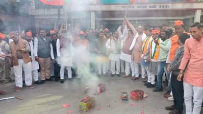 BJP activists celebrate victory in three states in party head quarter in Lucknow.