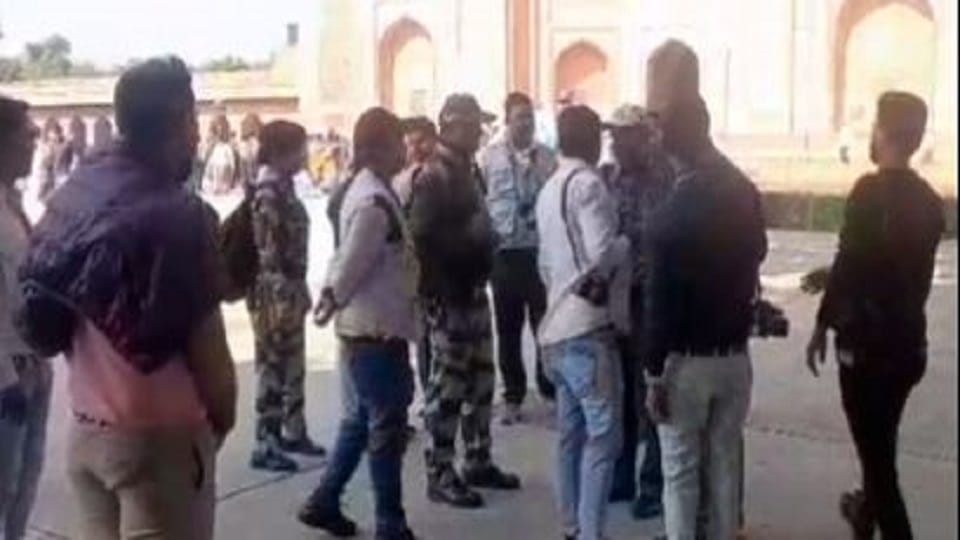 Dispute over taking photo of foreign tourist two photographers clashed with each other