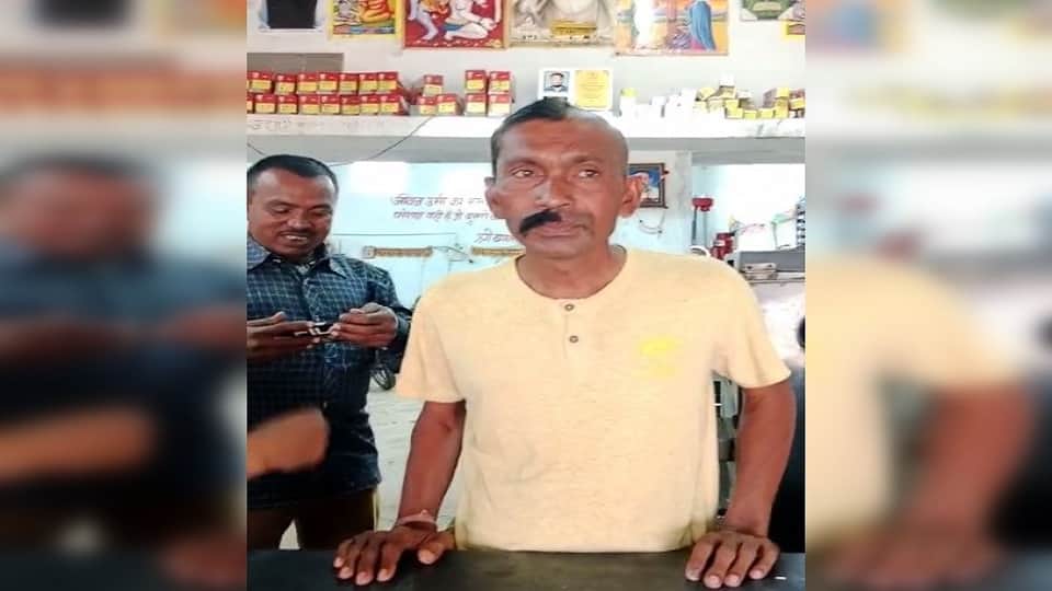 BJP supporter kept his promise shaved half his head and mustache after the defeat of BJP candidate in Mahasamu