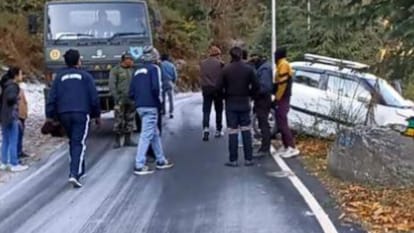 Tourists car slipped due to frost on Joshimath-Auli road Stuck on a stone major accident averted UttarakhandTo
