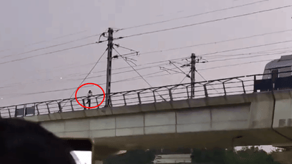 Girl tried to jump from track of Delhi Shadipur metro station viral video
