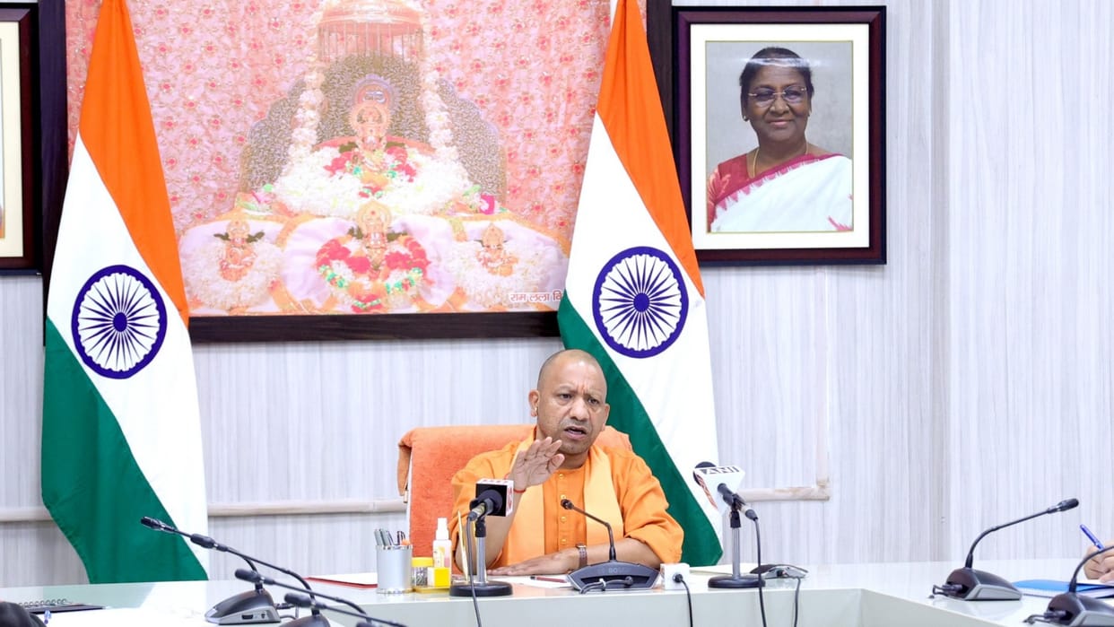 CM Yogi Adityanath talks to beneficiaries of Modi government schemes.
