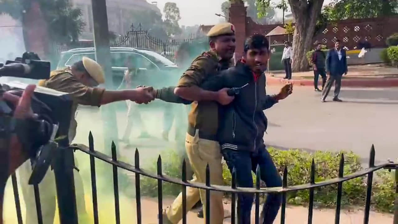 Parliament Security Breach: People who jumped into House beaten up by MPs before marshals catch them