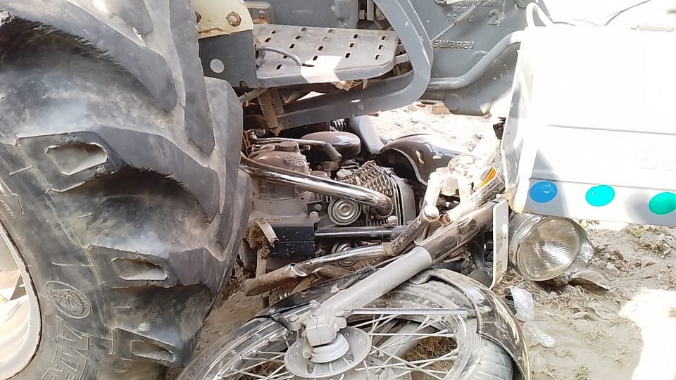 Tractor trolley hits bike, one dead
