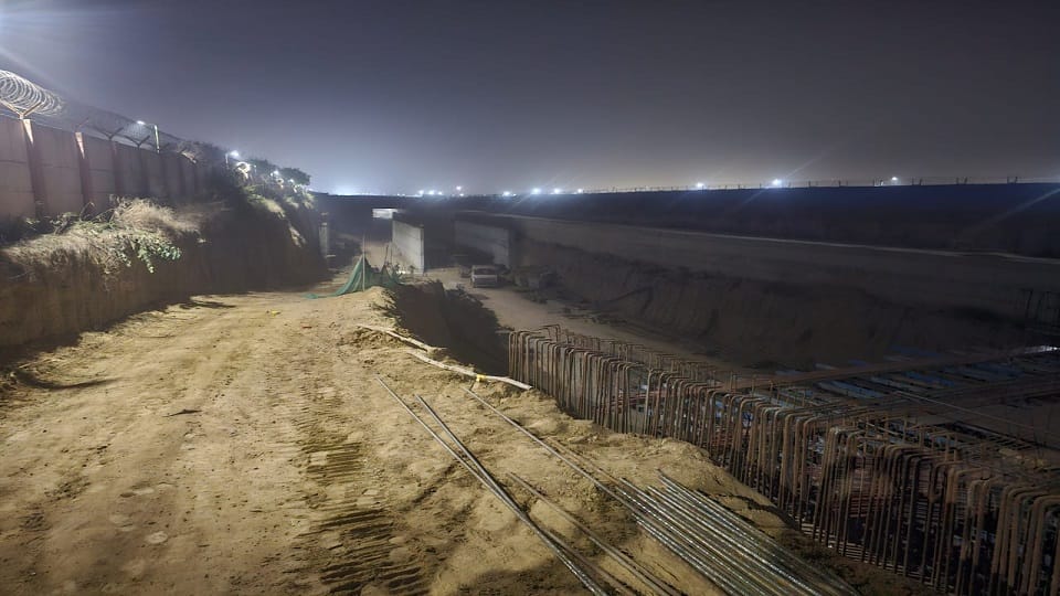 Mud caved in the tunnel being built near the airport in Delhi