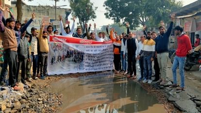 People angry over the condition of roads put up banners to boycott elections